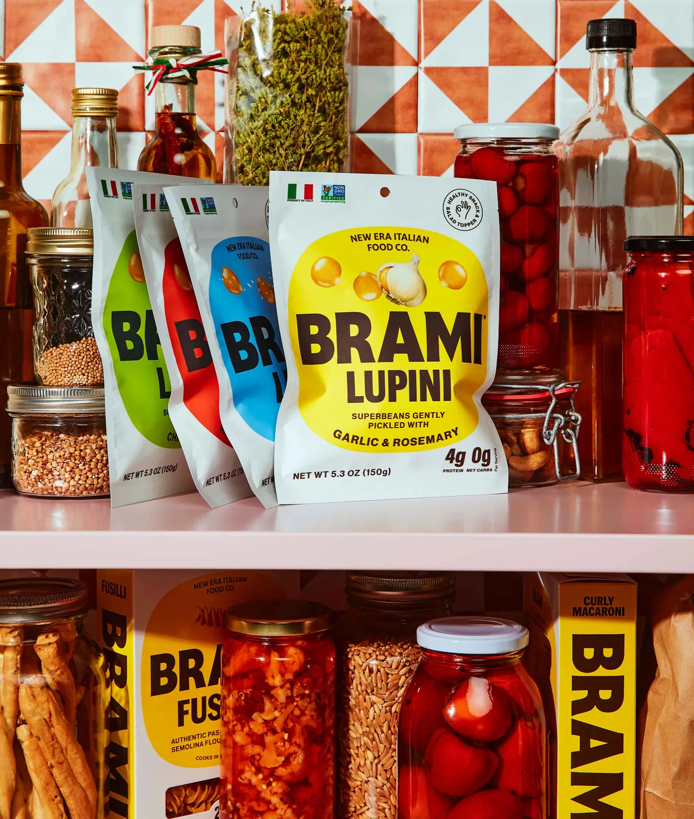 Jars of Brami lupini beans lined up on a grocery shelf